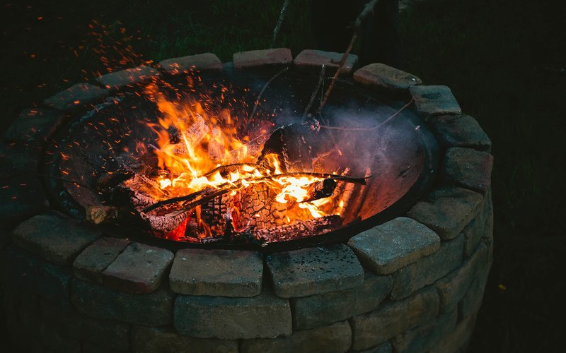 Fire and Water: Warming Up Your Pool and Patio with a Fire Pit